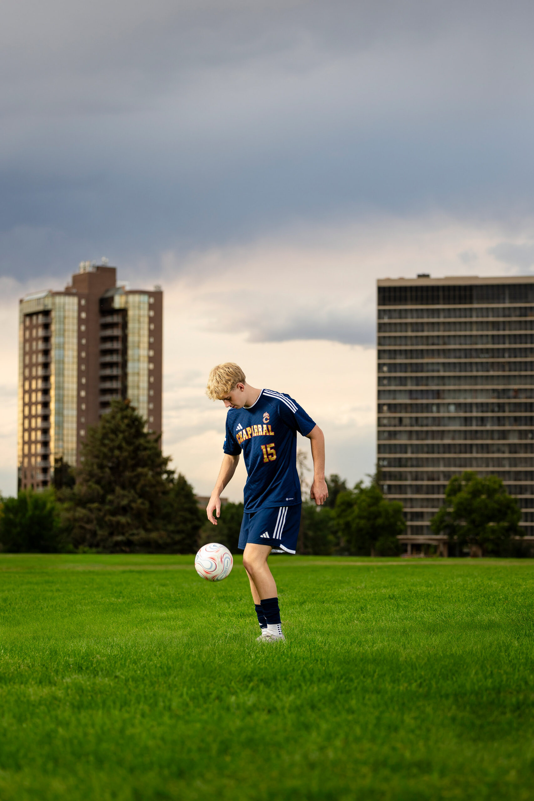 High school senior soccer portraits during golden hour at a Denver park