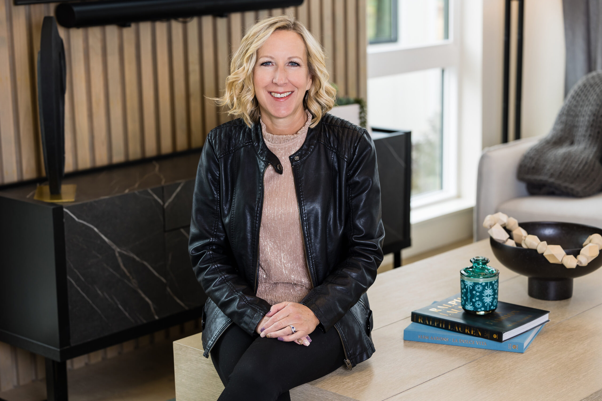 Headshot photography of real estate agent inside a brand new staged home.