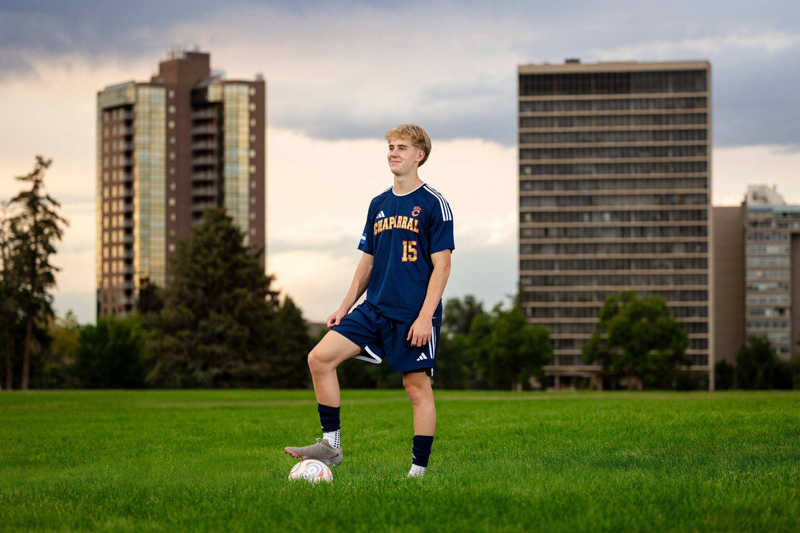 chaparral high school senior soccer player posing at sunset in cheesman park
