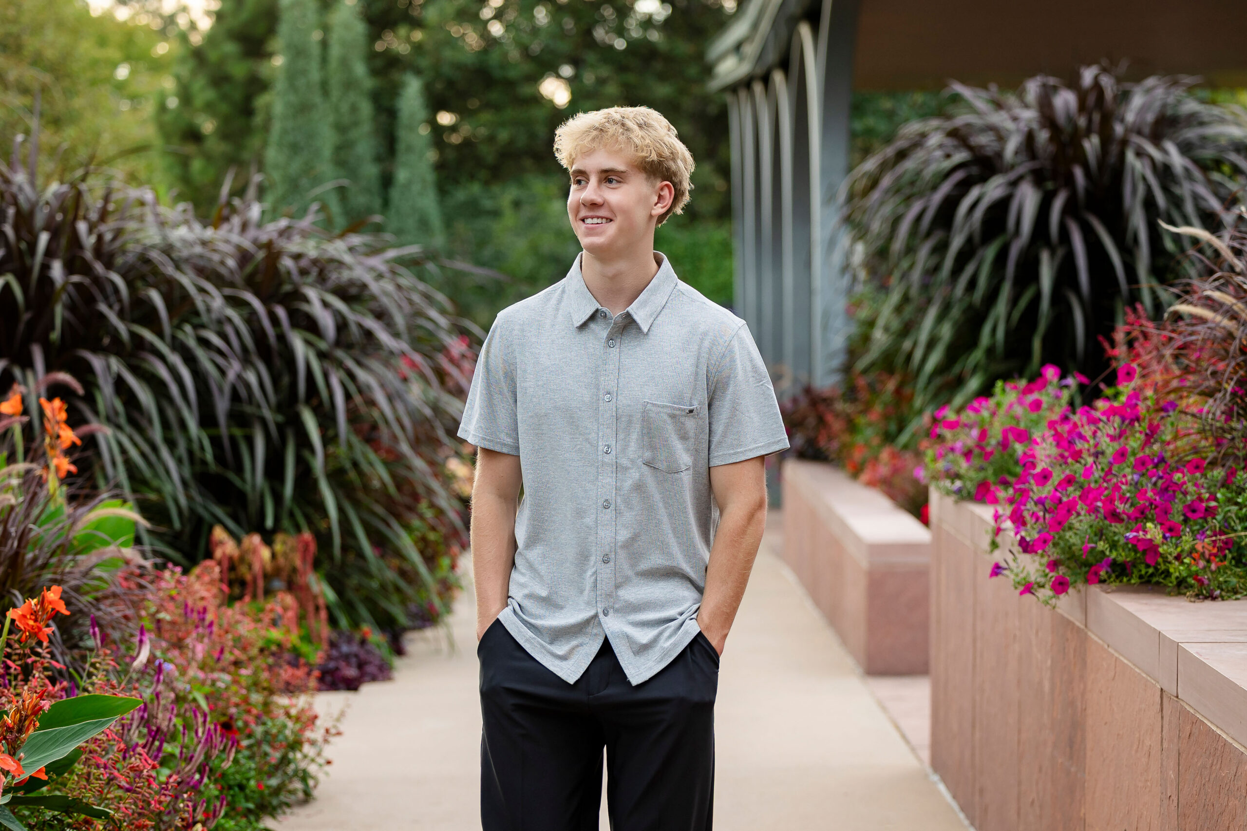 Senior portrait surrounded by greenery at Denver Botanic Gardens